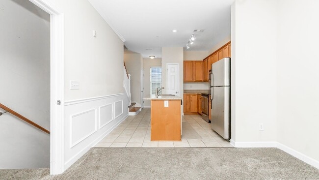 Building Photo - Located just Steps from Shopping, Dining, & Entertainment in The Market Common