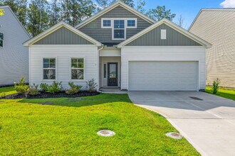 Building Photo - "Charming 3-Bed 2-Bath Residence in Telfai...