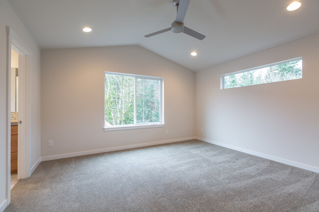 Vaulted Primary Bedroom W/ Ceiling Fan - 16009 NE 30th St