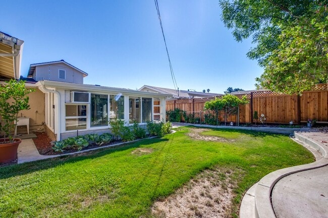 Building Photo - Turnkey Home with Natural Light & Upgrades...