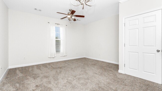 Building Photo - Located just Steps from Shopping, Dining, & Entertainment in The Market Common