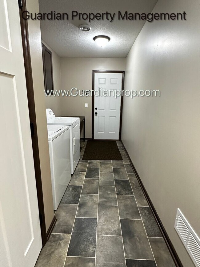 Building Photo - Lakeville Corner Unit, Walk out Patio, 2 Car Garage, W/D on Upper Level, 2.5 Baths