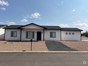 Building Photo - Dual Primary Suites & 2 Car Garage