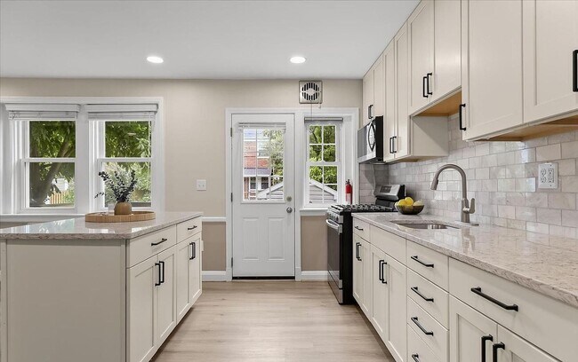 Building Photo - Updated 3BR Catonsville Townhome | Rear Parking + Deck