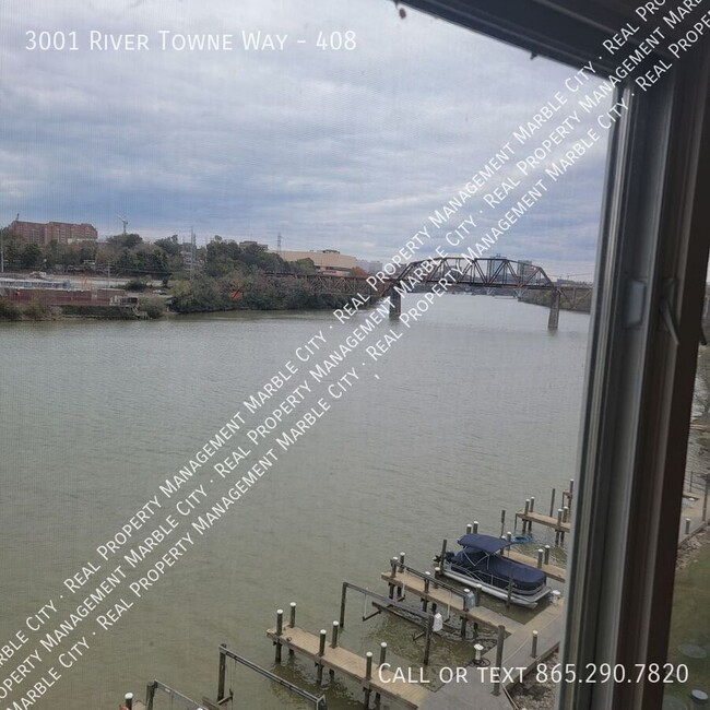 Building Photo - Amazing Riverfront Condo Living!