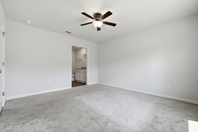 Building Photo - New community! Three bedrooms, two bathrooms and ready for you to move into!