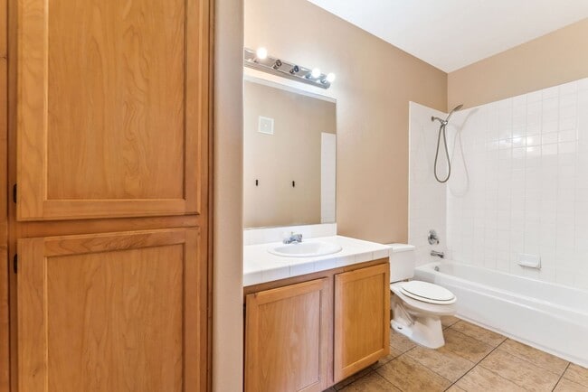 Building Photo - Bright & Stylish Condo with Fireplace and Private Balcony in a Resort-Style Community!