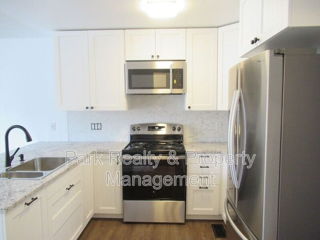 Building Photo - 9617 W Chatfield Ave