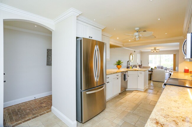 Building Photo - Live the Naples Lifestyle – Elegant 2BR/2B...