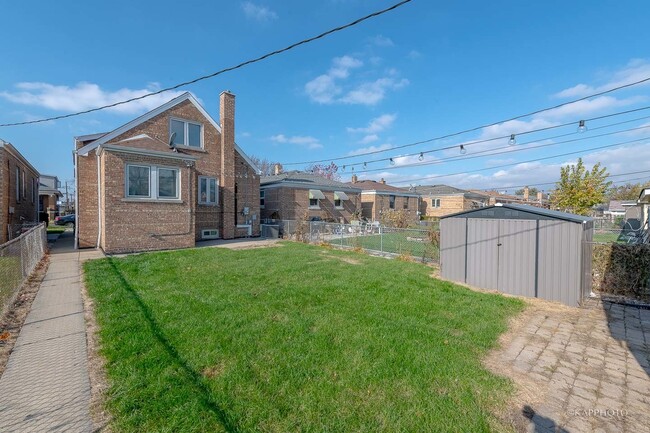 Building Photo - 6037 S Menard Ave
