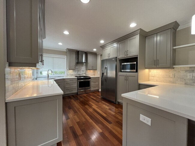 Building Photo - Stunning 4BR Home with Formal Living & Dining, Office & Gourmet Kitchen