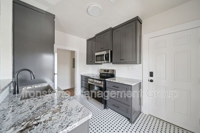 Building Photo - 1437 S Peoria Ave