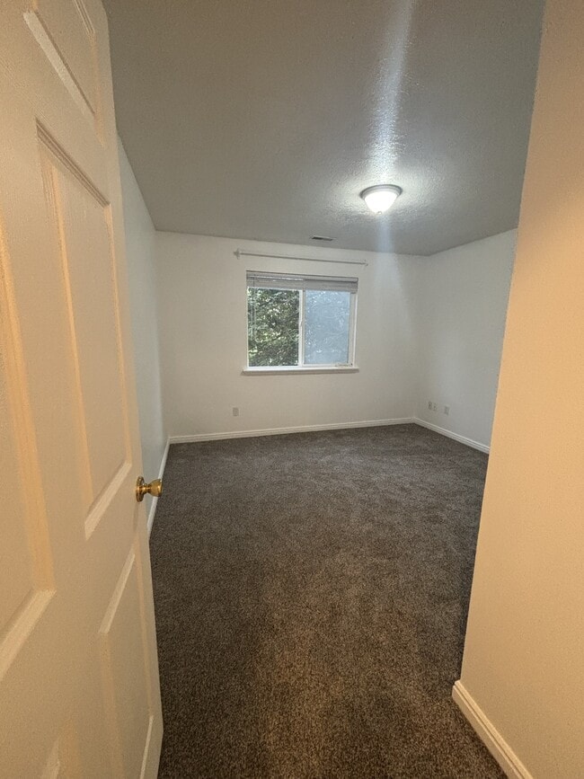 Building Photo - 8083 N Ridge Loop E