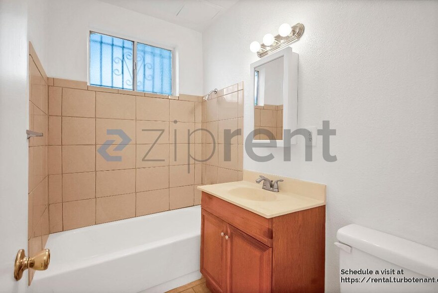 Building Photo - 2458 Normandie Ave