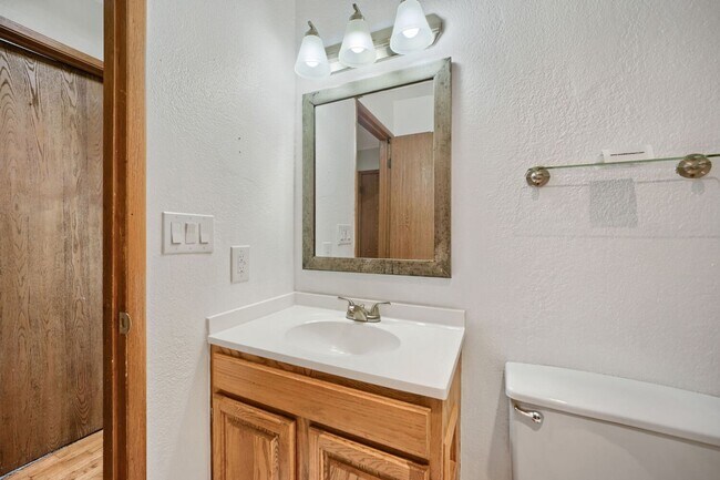 Building Photo - AVAILABLE NOW! 2BR/2BA Condo – Awesome Location! Glossy Hardwoods, Granite Countertops, W/S/G Inc...