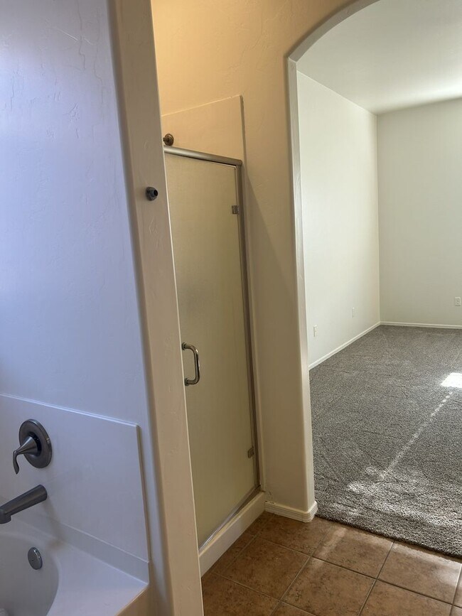 Building Photo - Unfurnished four bedroom large home!  Three car garage