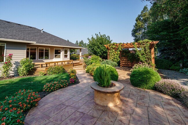 Building Photo - Beautifully Landscaped 1/4 acre with Well Maintained 4 bedroom 2 Bath Home with 3 Car Garage