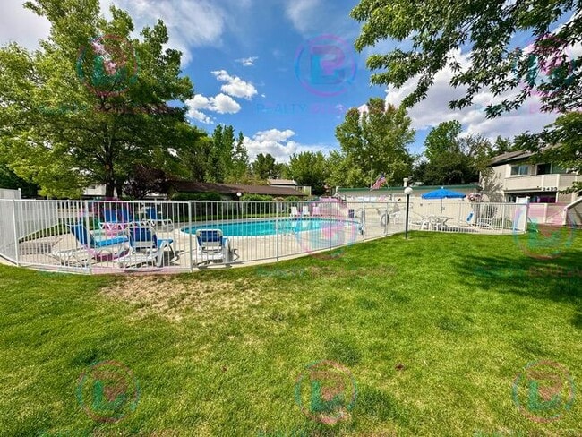 Building Photo - Contemporary 2-Bed Condo with Garage & Poo...