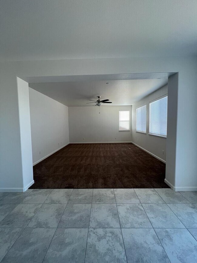Building Photo - Spacious 4-Bedroom Retreat with 2.5 Baths in Los Banos – Your Ideal Family Home Awaits in a gated...