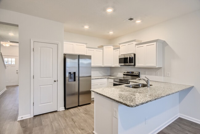 Building Photo - Move-In Special! 3 Bed/3 Bath Townhome with Garage / Pet-Friendly / Available Now!