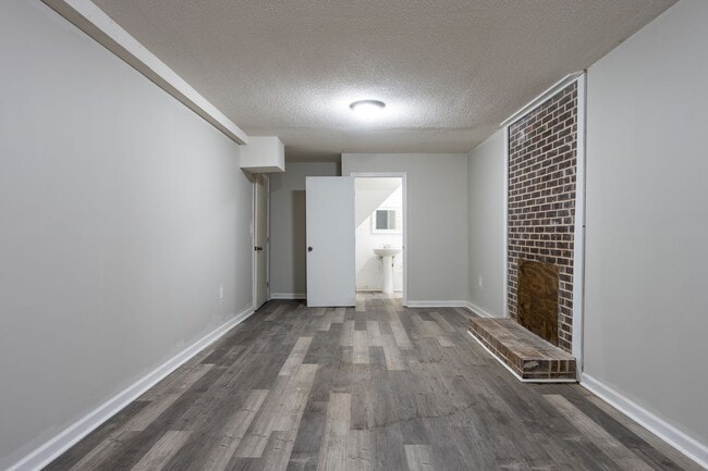 Building Photo - Newly renovated, spacious and versatile house waiting to be a home!