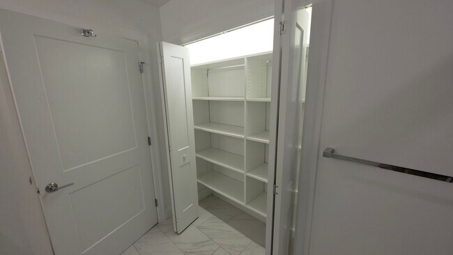 Building Photo - Luxury 2-Bed with Massive Closets and Built-in Storage