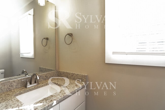 Building Photo - This lovely 3BR, 2.5BA home is move-in ready