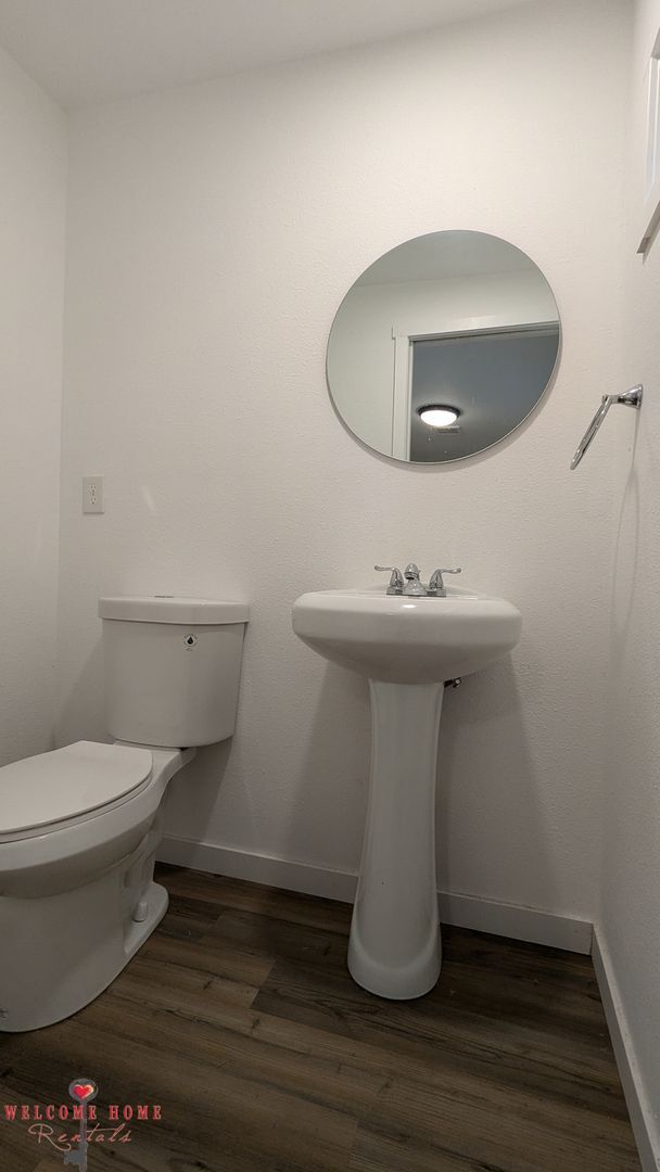 Building Photo - 4 bedroom home with air conditioning - Great location!!!  HUGE basement for your man cave or she ...