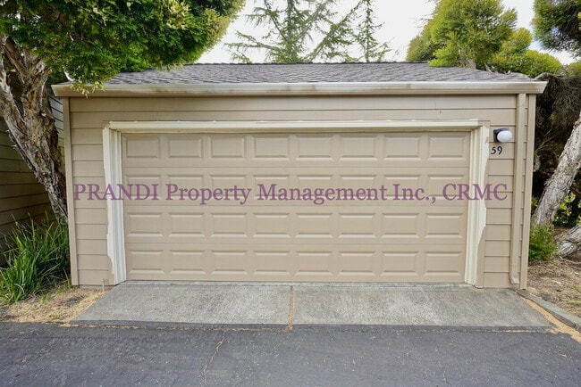 Building Photo - Modern Ground Floor Condo with 2 Car Garage!
