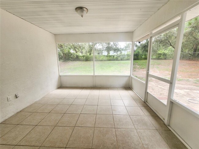 Building Photo - 9392 N Sandree Dr