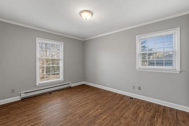 Building Photo - Large Brick Ranch, New Wood Like Flooring Throughout, Just Painted, LR, Den, Sun Room, Carport!