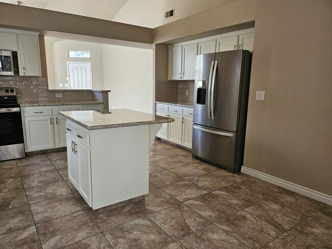 Building Photo - Completely remodeled home at Maple & Inter...