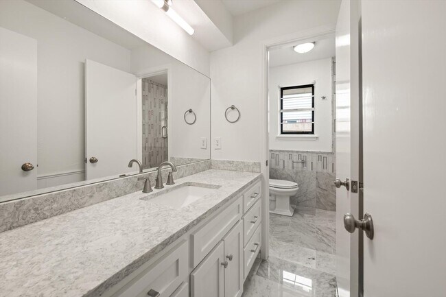 Building Photo - Modern Details and Interiors to a sought-a...