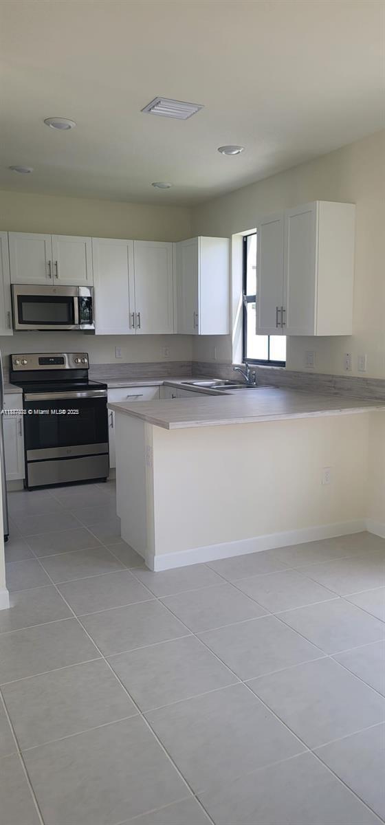 Building Photo - 11083 West 33rd Ct