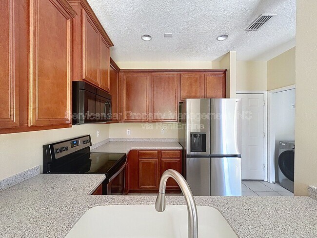 Building Photo - 8528 Sandpiper Ridge Ave