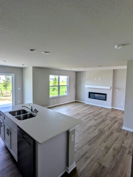 Kitchen Island and Living Room Fireplace - 4302 NE 13th St