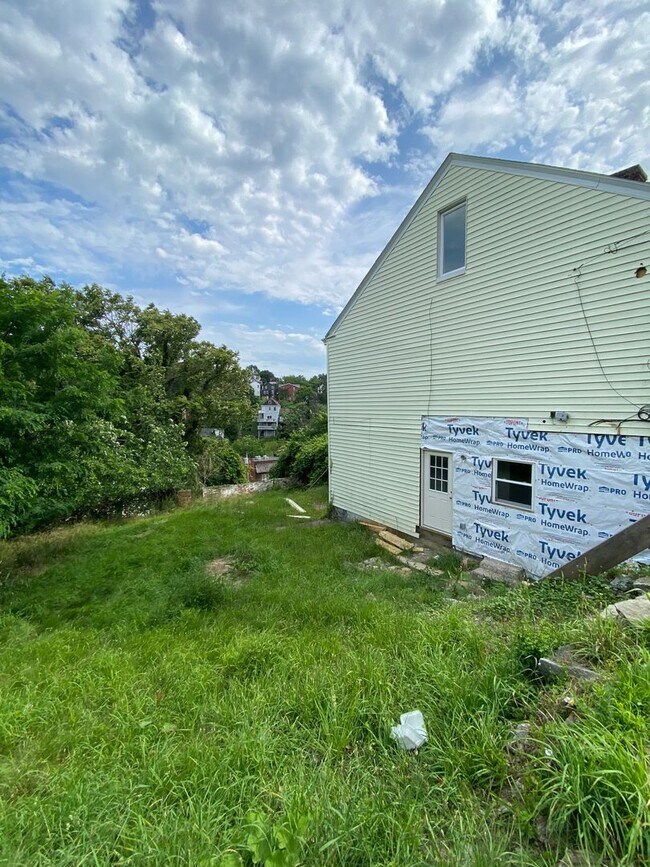 Building Photo - Available July 2026 - Completely renovated 3 bedroom home!
