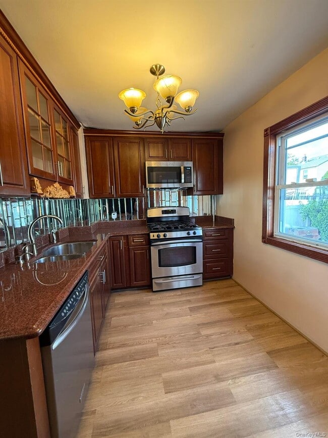 Building Photo - 221-29 106th Ave