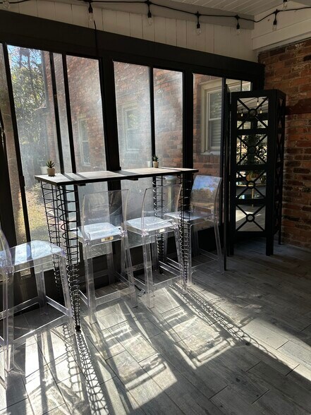 Rain or shine, this covered patio is made for relaxing moments. - 5460 Scofield Rd