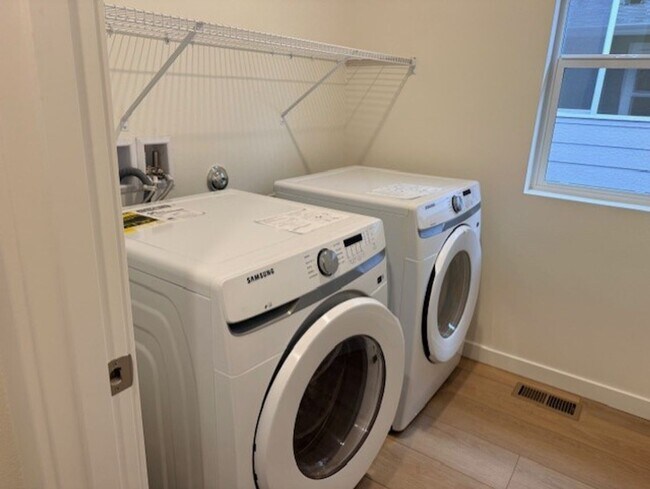 Building Photo - Elegant 4-Bed, 4-Bath 3-Story Home with Gourmet Kitchen & Private Backyard