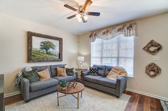 Building Photo - All-brick townhome living, minutes from it all.