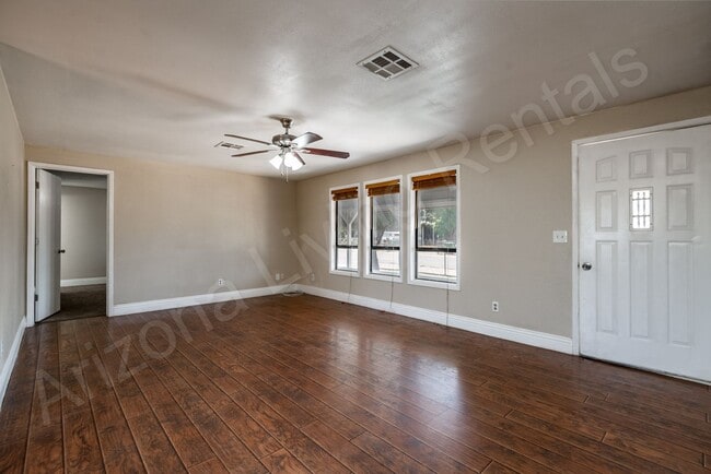 Building Photo - LARGE FENCED YARD WITH DETACHED GARAGE