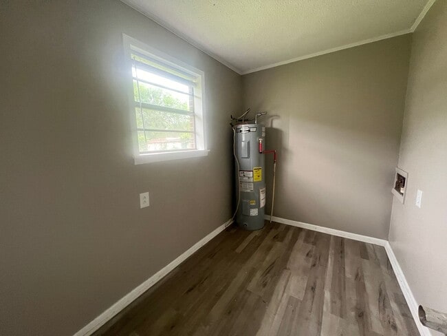 Building Photo - Three bedroom home with XL garage!