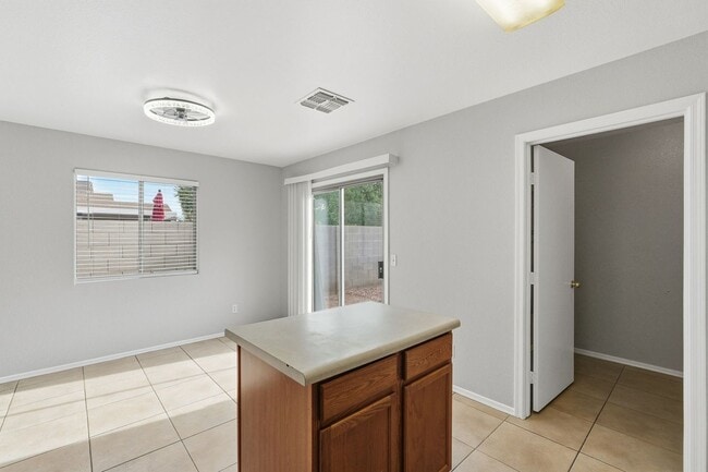 Building Photo - Johnson Ranch 3 Bedroom! Tile Throughout All Appliances!