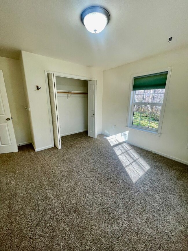 Building Photo - Ranch style 3bedroom/2 bathroom with an Oversized two car garage +giant carport!  Large private l...