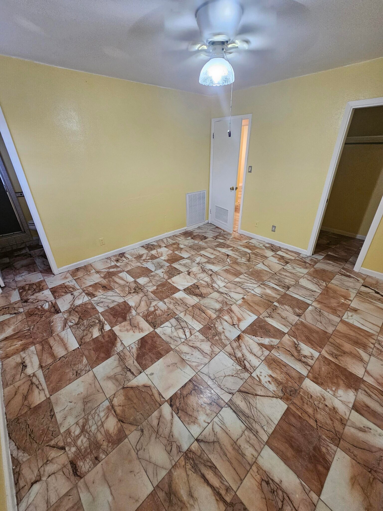 Master Bedroom with Closet, Celing fan and Bathroom - 618 Land O Lakes Dr