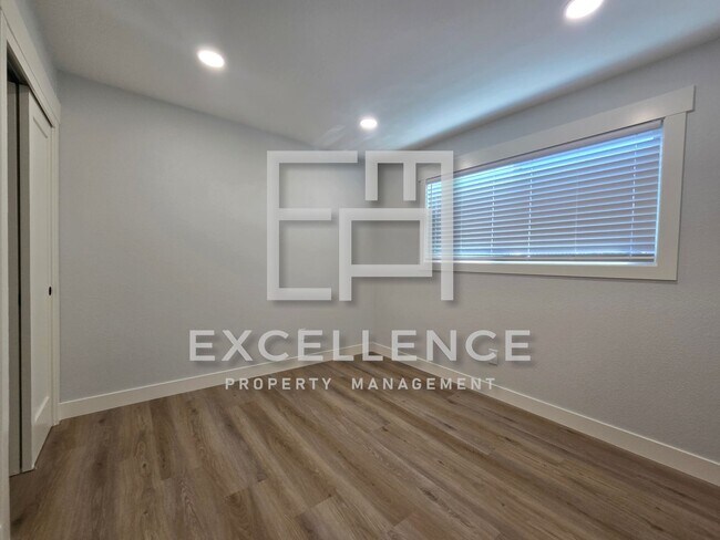 Building Photo - All Newly Remodeled Throughout Home With Huge Yard
