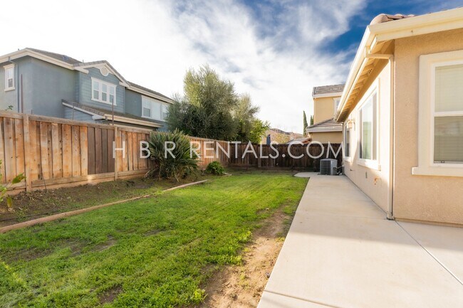 Building Photo - Spacious 4-Bed, 3-Bath Home with a Beautiful Garden in Mountain House! *FIRST FLOOR BEDROOM and F...