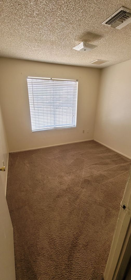 Building Photo - 3-Bedroom Home with Spacious Backyard & Ca...