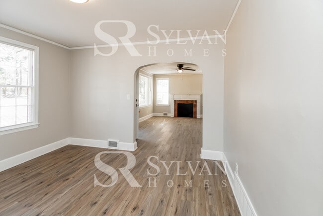 Building Photo - The living is easy in this 3 bedroom, 2 bathroom brick home